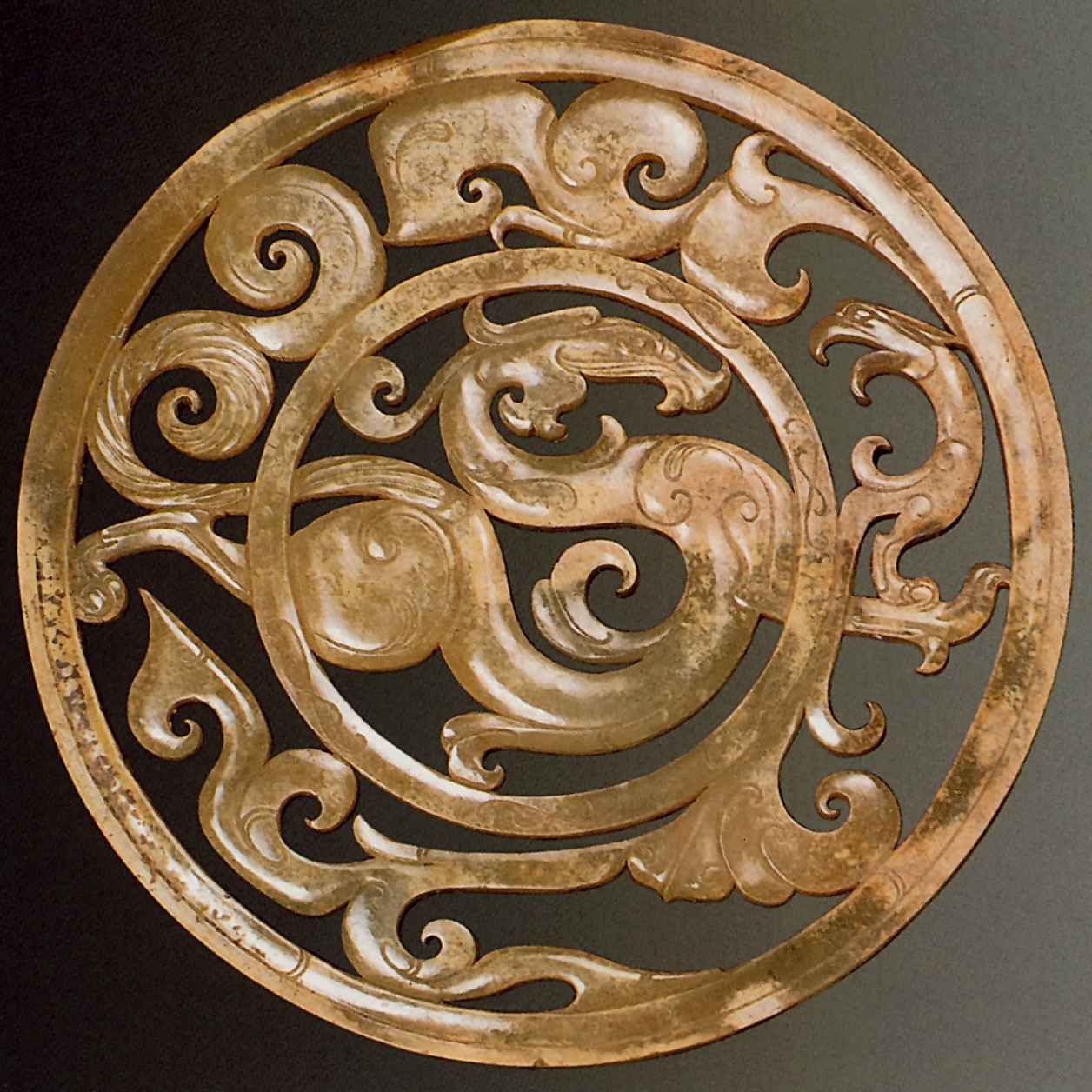 Орнаментальный круг с изображением дракона и феникса